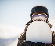 Woman snowboarding